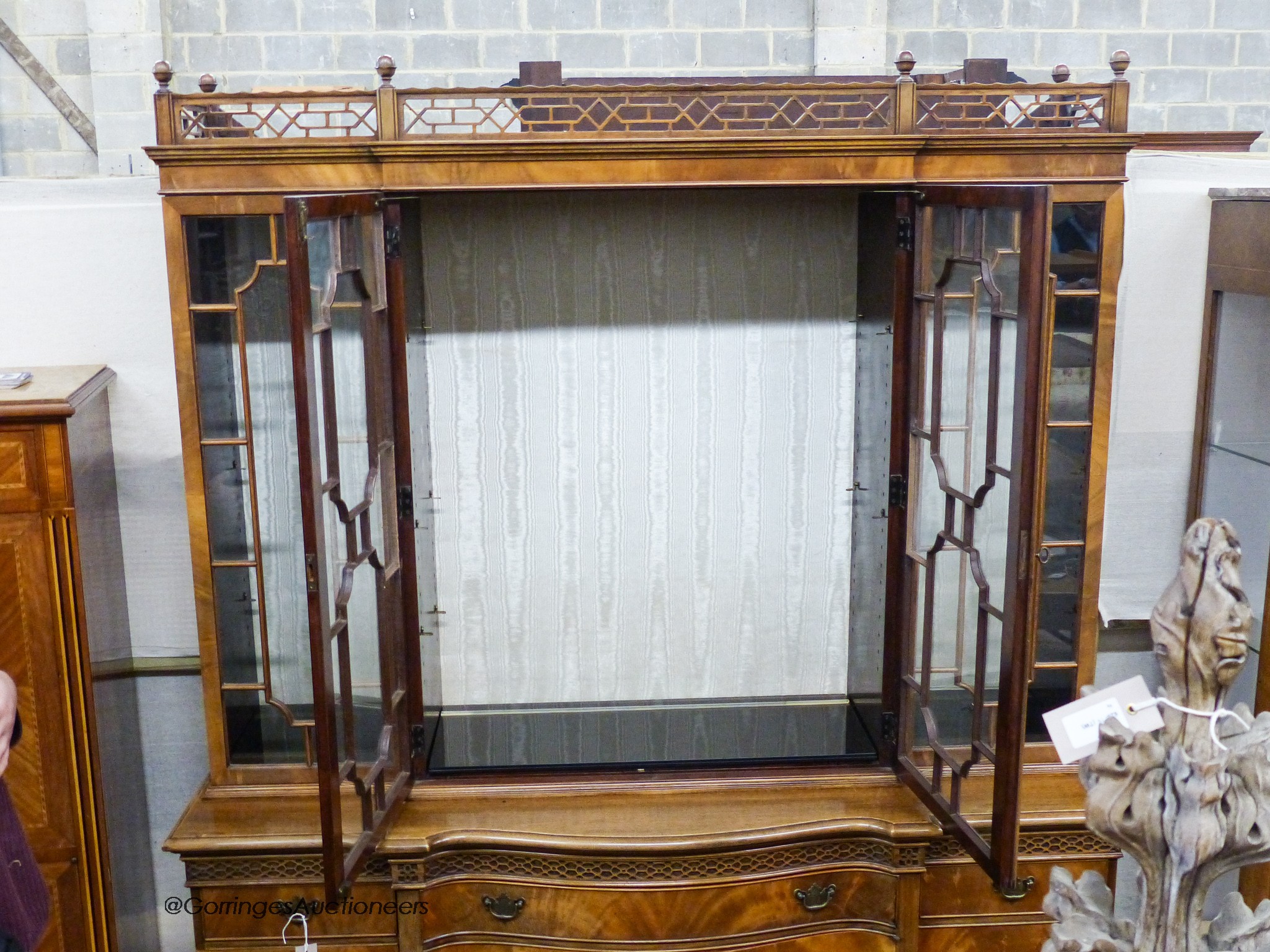 A Georgian style mahogany serpentine front library bookcase, width 160cm, depth 50cm, height 198cm
